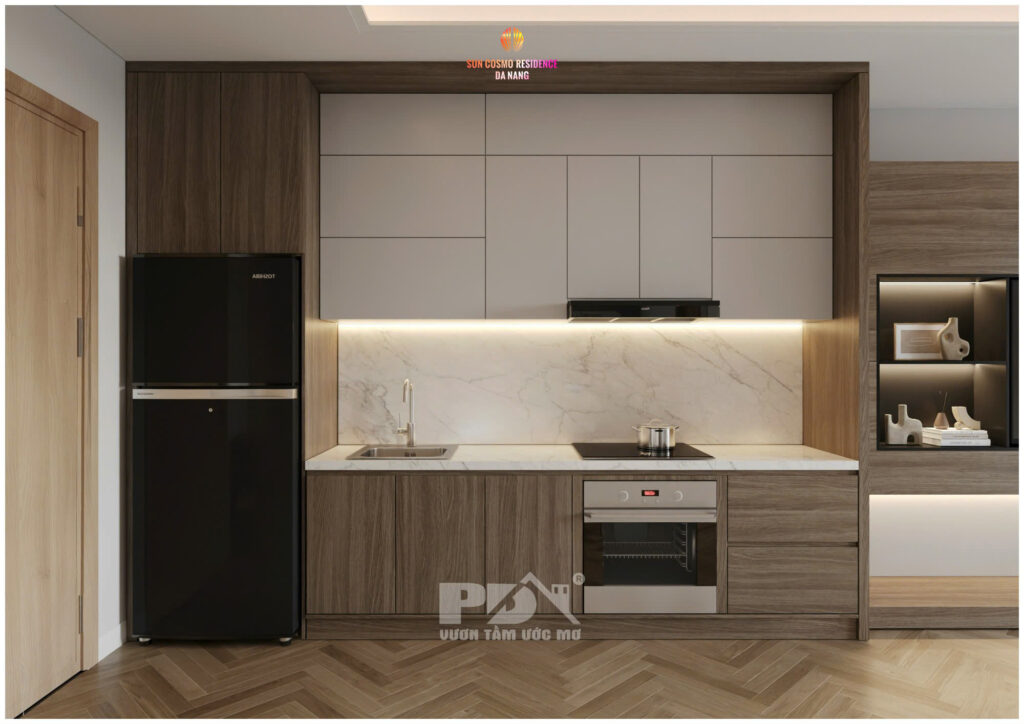 Khu vực bếp được sắp xếp ngay bên cạnh cửa đi để tận dụng tối đa diện tích của không gian