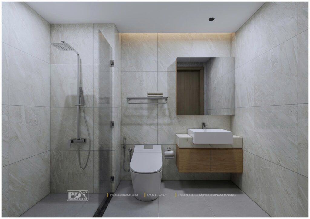Nhà vệ sinh tách biệt phía sau khu bếp, bảo đảm riêng tư và thông gió tốt.