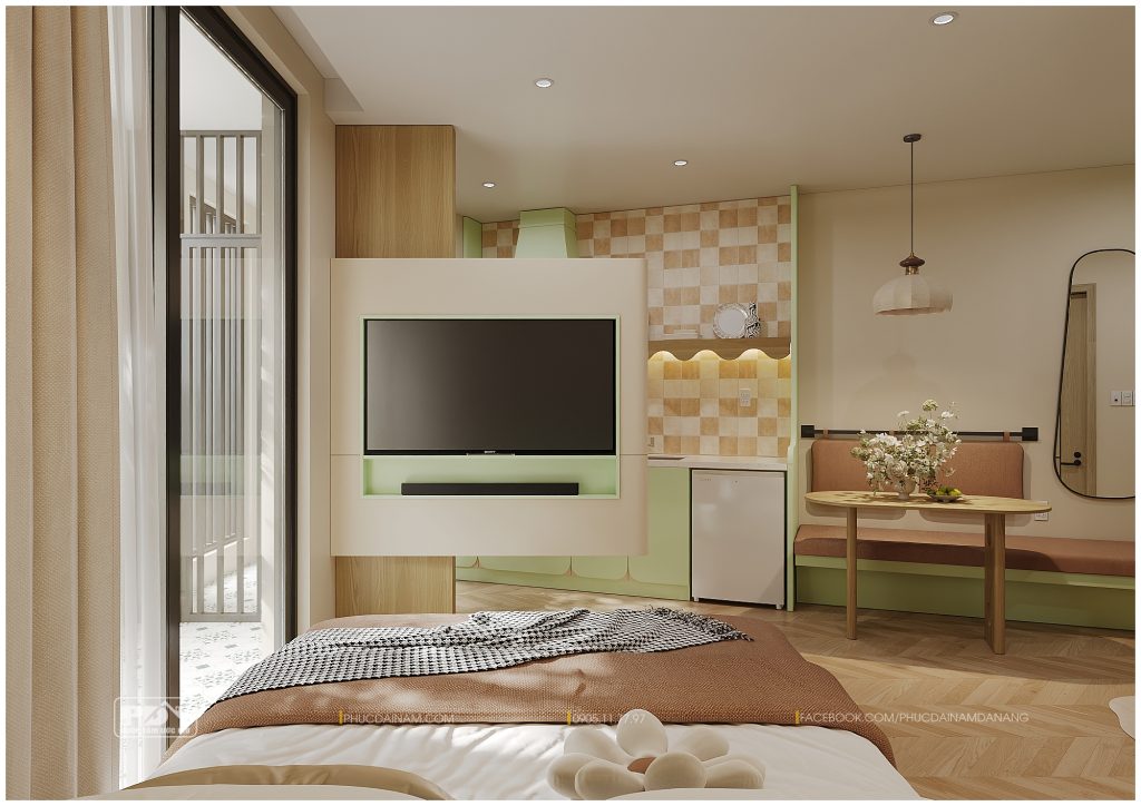Kệ tivi được thiết kế vừa đáp ứng nhu cầu giải trí, vừa là vách ngăn khéo léo giữa khu vực bếp và ngủ
